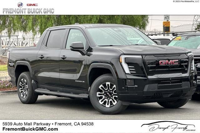 2026 GMC Sierra EV Elevation Standard Range in Onyx Black — front three-quarter view