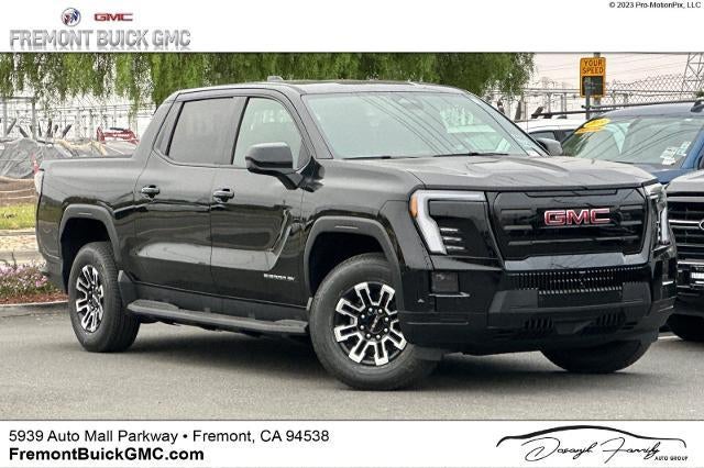 2026 GMC Sierra EV Elevation Standard Range in Onyx Black — front three-quarter view