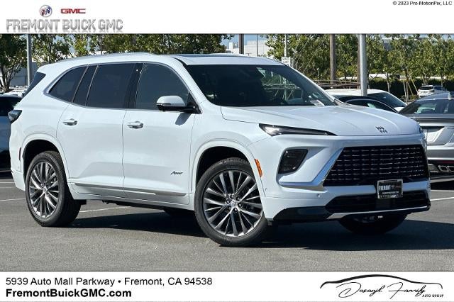 2026 Buick Enclave Avenir in Iridescent White Tricoat — front three-quarter view