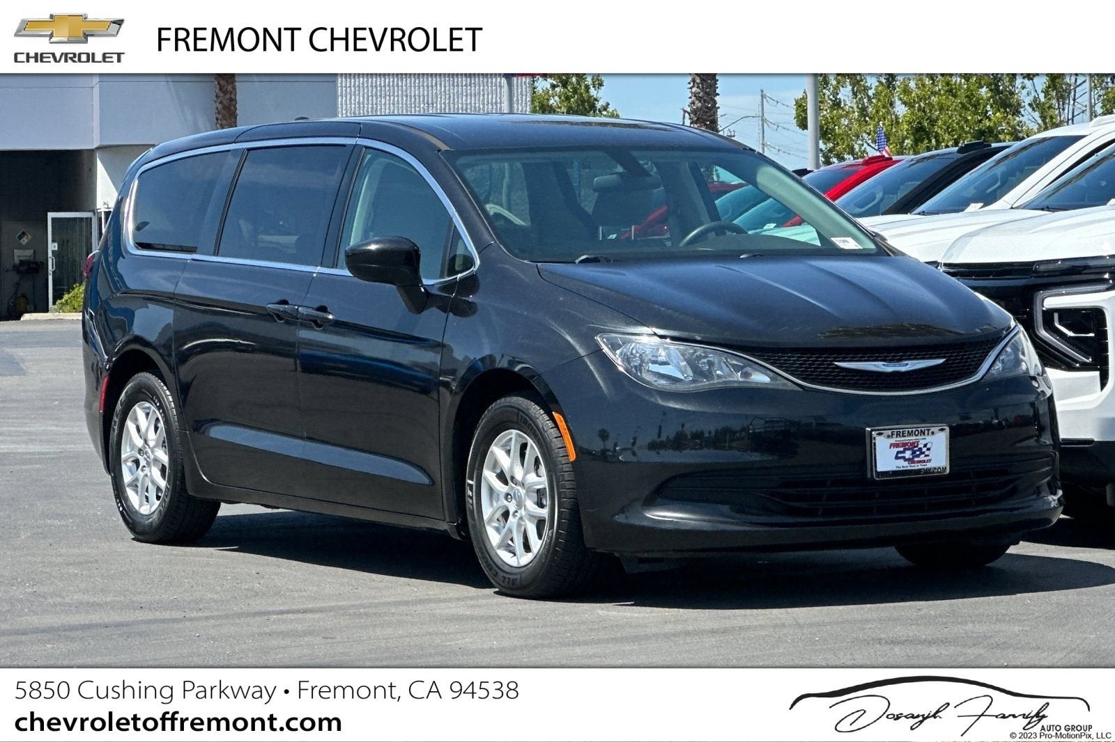 2018 Chrysler Pacifica Touring in Black — front three-quarter view
