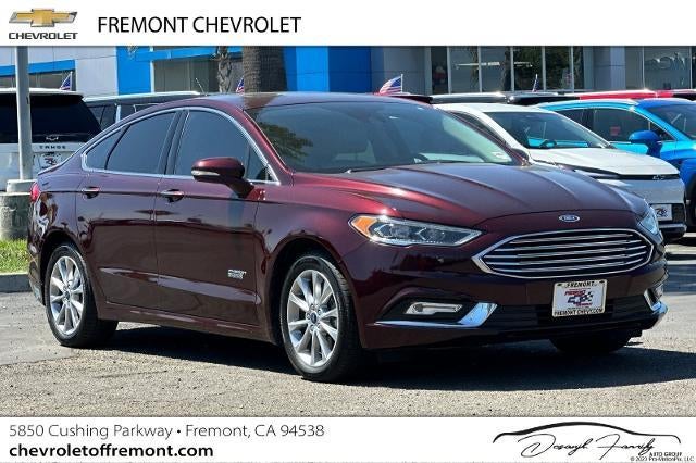 2017 Ford Fusion Energi SE Luxury in Red — front three-quarter view