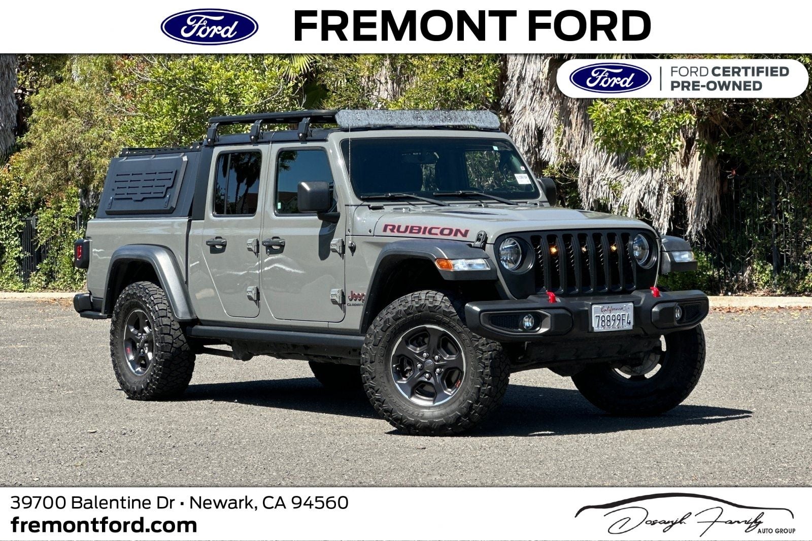 2022 Jeep Gladiator Rubicon in Sting-Gray Clearcoat — front three-quarter view